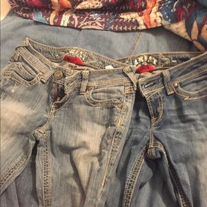 2 pair ariat jeans